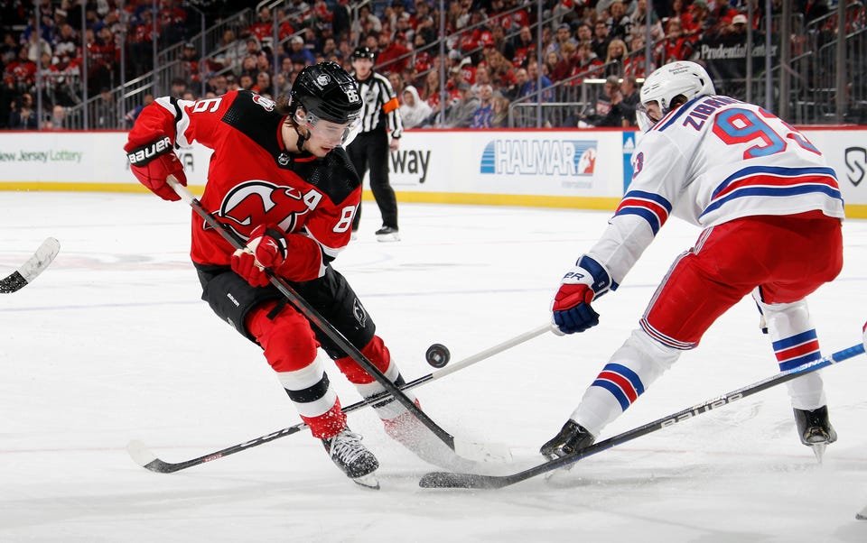 Devils survive late-game scare, beat Wild 5-3 